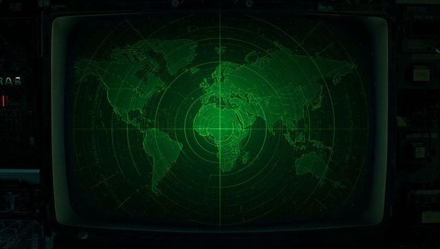 Green Radar World Map on Curved Command Center Screen