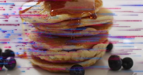 Glitch Art Improves Stack of Pancakes with Pouring Syrup and Blueberries