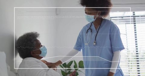 Nurse Supporting Elderly Patient Wearing Mask at Bedside, Compassionate Hospital Care