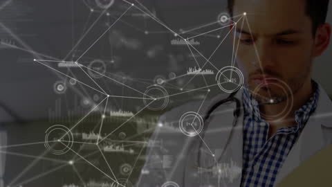 Doctor Analyzing Reports with Holographic Data Interface