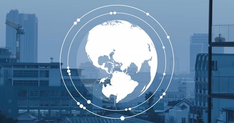 Abstract digital globe over modern cityscape