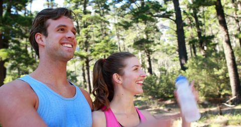 Energetic Young-Couple Enjoying Forest Workout Break Together - Download Free Stock Images Pikwizard.com