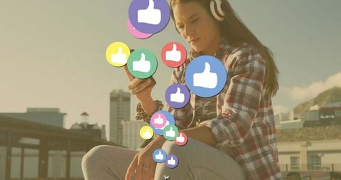 Young Woman Engaging with Social Media on Rooftop