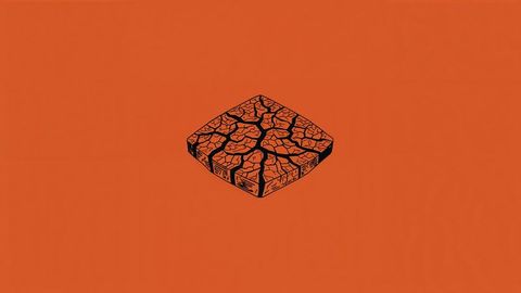 Square cracked earth tile on orange background design
