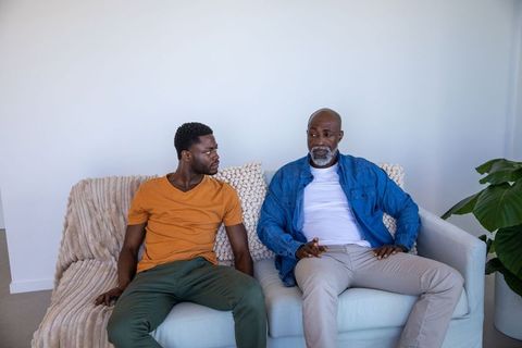 Father and Son Bonding in Modern Living Room