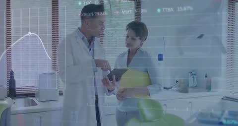 Doctor Discusses Digital Data with Patient in Modern Clinic