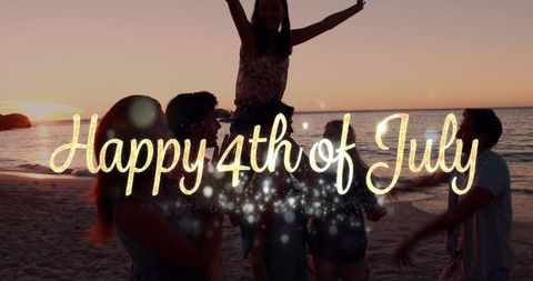 Friends Celebrating 4th of July on Sunset Beach with FestiveAtmosphere - Download Free Stock Images Pikwizard.com