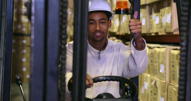 Warehouse Worker Operating Forklift Giving Thumbs Up - Download Free Stock Images Pikwizard.com