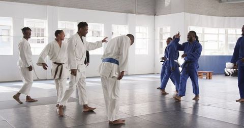 Martial arts students practicing discipline and teamwork