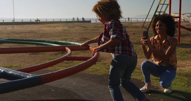 Mother and Son Enjoying Playground on Sunny Day - Download Free Stock Images Pikwizard.com