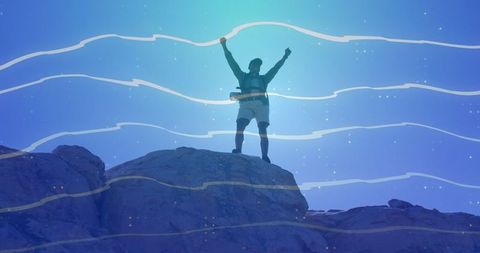 Triumphant Hiker on Mountain Summit Celebrating Achievement