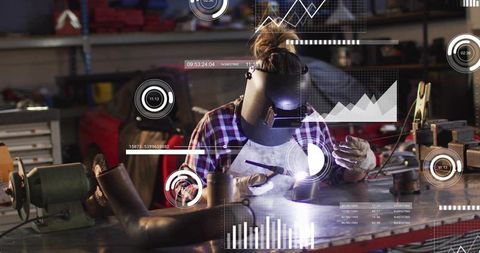Female welder performing precision arc welding in workshop with futuristic hud overlays