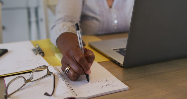 Senior Woman Writing Notes and Using Laptop at Home - Download Free Stock Images Pikwizard.com