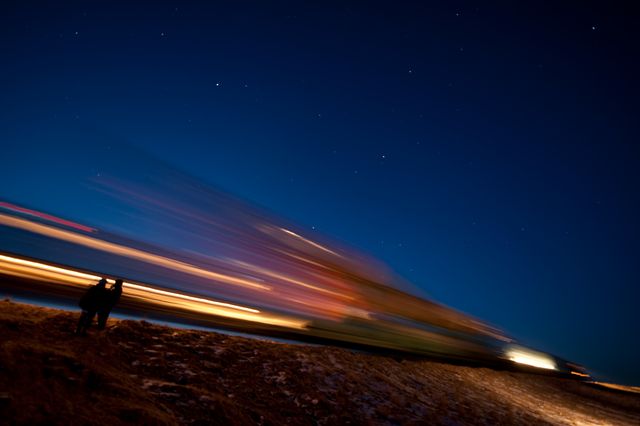 The Soyuz TMA-17 spacecraft is seen in this long exposure as it is rolled out by train to the launch pad at the Baikonur Cosmodrome, Kazakhstan, Friday, Dec. 18, 2009.  The launch of the Soyuz spacecraft with Expedition 22 NASA Flight Engineer Timothy J. Creamer of the U.S., Soyuz Commander Oleg Kotov of Russia and Flight Engineer Soichi Noguchi of Japan, is scheduled for Monday, Dec., 21, 2009 at 3:52a.m. Kazakhstan time.  Photo Credit (NASA/Bill Ingalls)