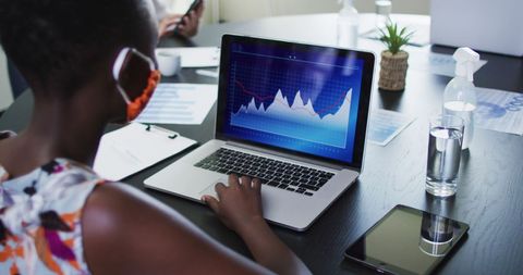 Remote Work and Data Analysis in Modern Office Environment - Download Free Stock Images Pikwizard.com