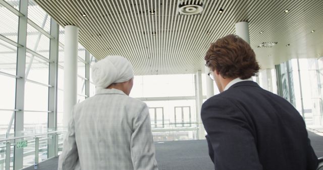 Diverse Business Colleagues Walking in Modern Office Building - Download Free Stock Images Pikwizard.com