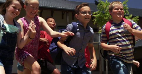 Joyful Diverse Schoolchildren Running Outdoors in Summer - Download Free Stock Images Pikwizard.com