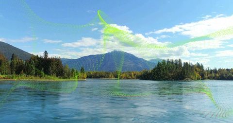 Mountain lake reflecting neon-green digital swirls over forested shoreline and island