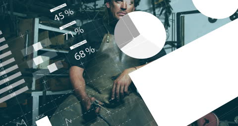 Businessman Analyzing Financial Data with Digital Graphs