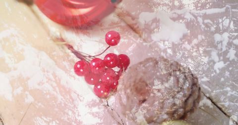 Festive christmas decorations with pine and red cherries