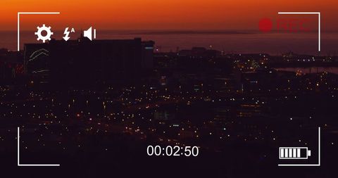 Night traffic in cityscape through camera viewfinder