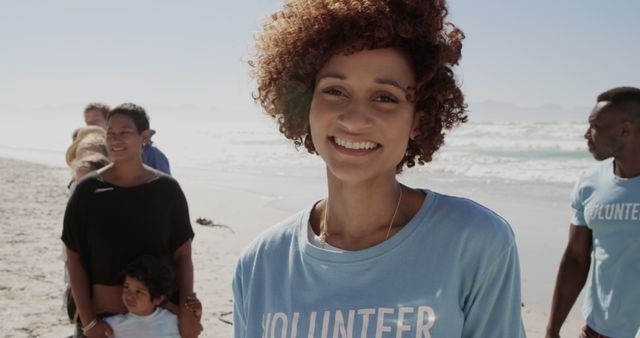 Smiling Volunteers on Beach Clean-Up Day - Download Free Stock Images Pikwizard.com