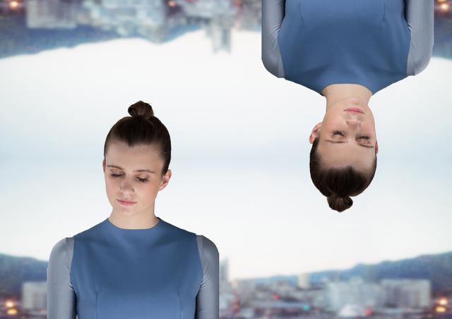 Digital composite of up side down city blurred and futuristic woman