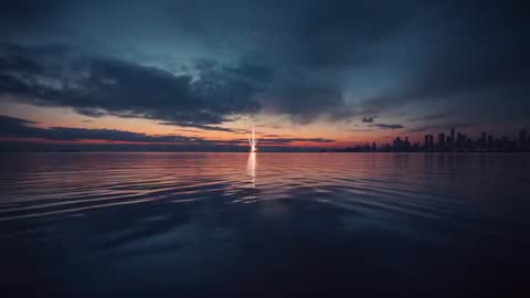 Golden Firework Exploding Over Water at Dusk