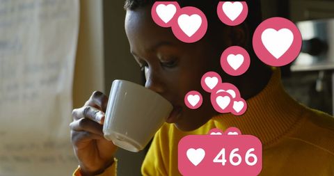 Woman Engaging with Social Media While Enjoying Coffee