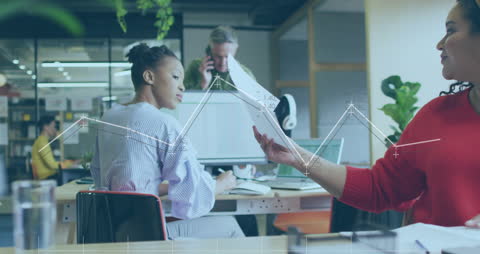 Business Team Analyzing Data and Networking in Modern Office