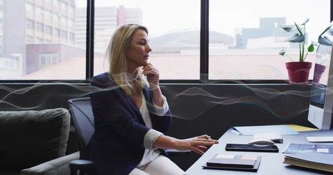 Businesswoman Executing Professional Tasks in Modern Office