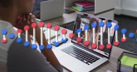 Office Worker Analyzing 3D Molecular Model at Tech Desk