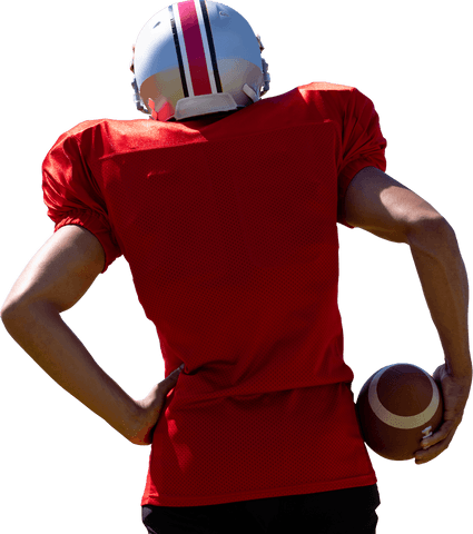 Biracial male american football player holding ball on transparent background