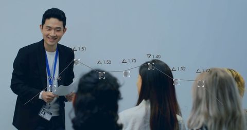 Data-Driven Presentation with Colleagues in Modern Office Environment - Download Free Stock Images Pikwizard.com