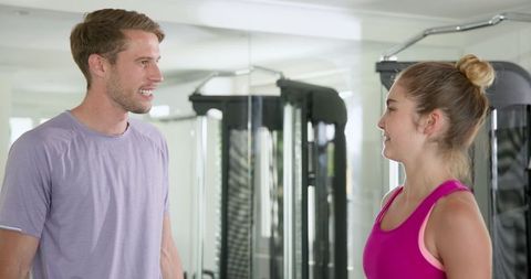 Couple Engaging in Fitness Activities for Wellness and Health at Home