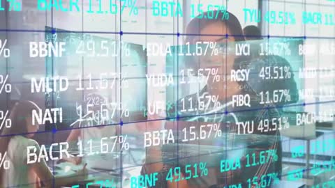 Business Team Analyzing Dynamic Financial Data in Modern Meeting