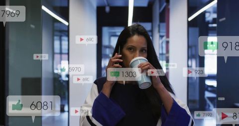 Businesswoman Engaging with Social Media Analytics in Office Environment