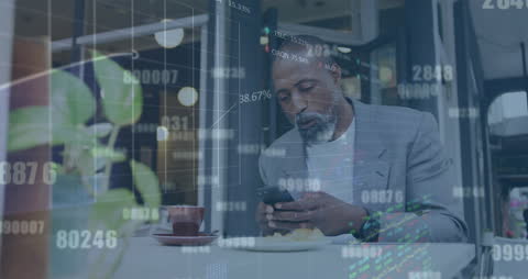 Businessman Analyzing Financial Data on Smartphone in Cafe