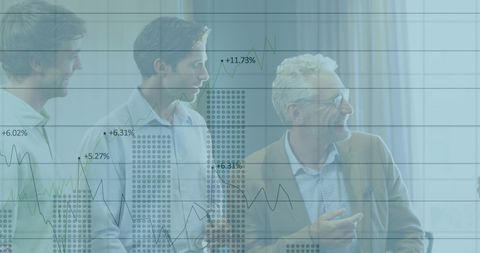 Business Colleagues Analyzing Stock Market Trends in Office Meeting