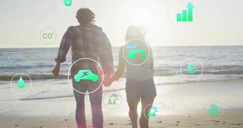 Eco-Conscious Couple Walking Hand in Hand Towards Beach Sunset