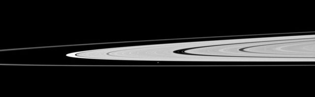 Saturn moon Atlas, just below the center of this image taken by NASA Cassini spacecraft, orbits in the Roche Division between the A ring and thin F ring.