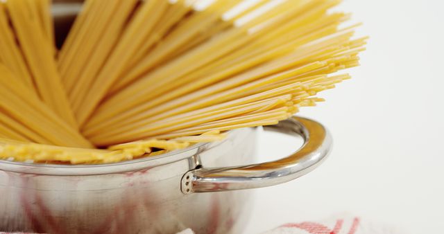 Uncooked Spaghetti in Stainless Steel Pot Ready for Cooking - Download Free Stock Images Pikwizard.com