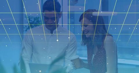 Teamwork collaborating on technology project with data overlay