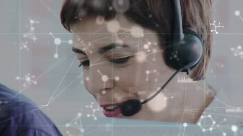 Businesswoman with Headset Analyzing Network Connections