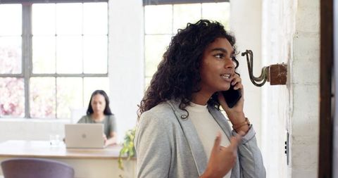 Modern coworking space with professionals engaged in tasks