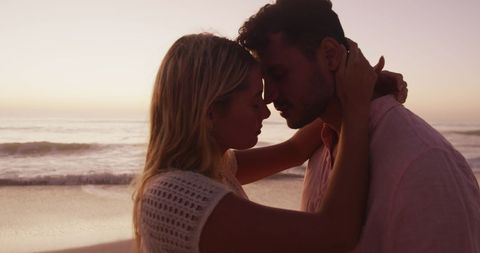 Romantic Sunset Embrace at Beautiful Beach Shore