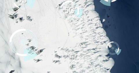 Aerial View of Snowy Terrain with 5G Network Overlay