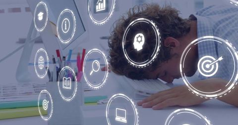 Exhausted office worker amidst modern technology icons, concept of stress