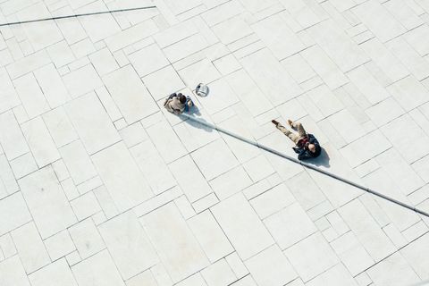 Overhead View of People Resting on Modern Urban Design