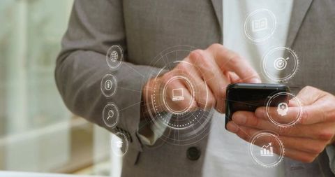 Businessman Tapping Smartphone with Futuristic Holographic Interface for Digital Workflow